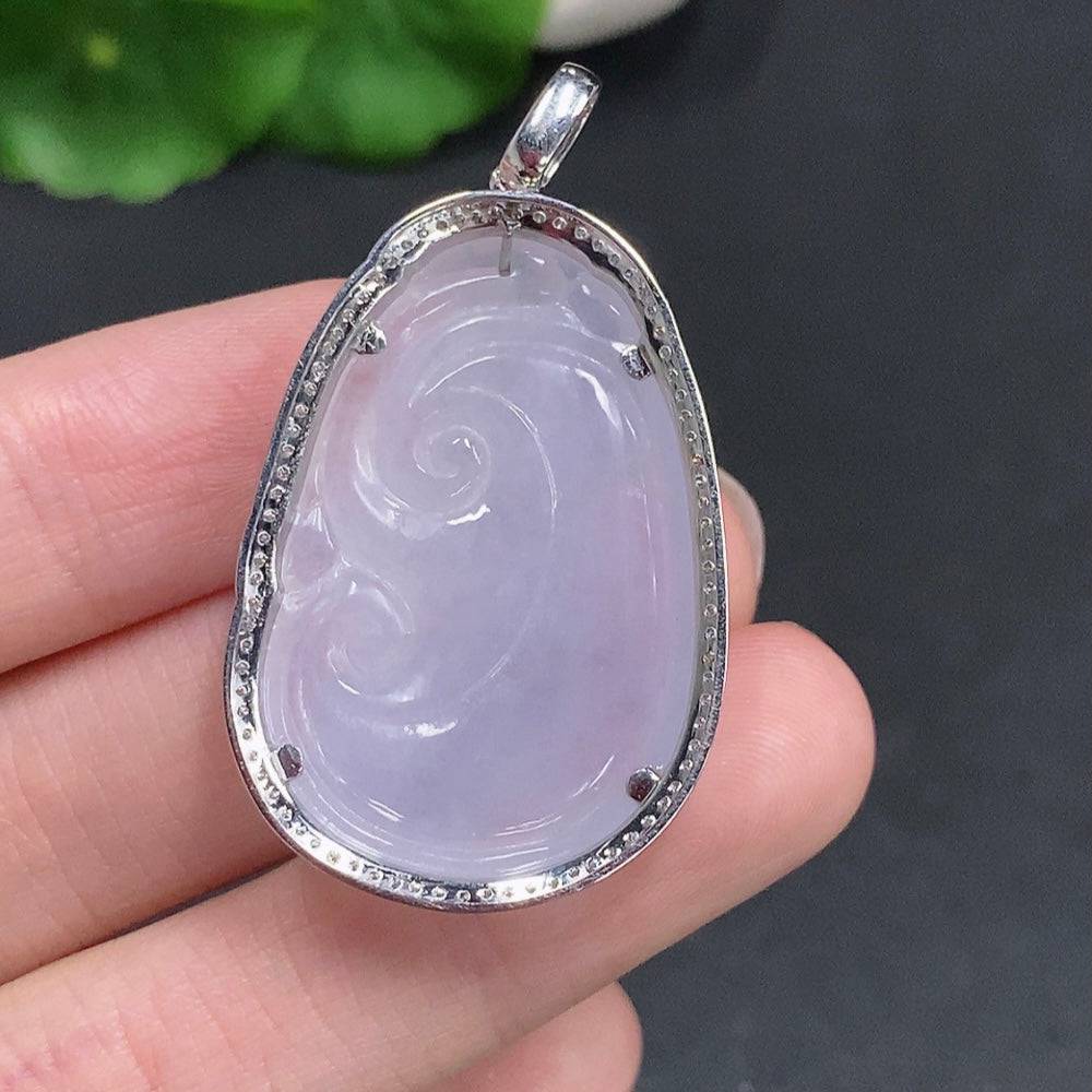 Huiliu Jadeite Ruyi pendant in green jade with carved details, certified by Huiliu, showcasing traditional Chinese craftsmanship.