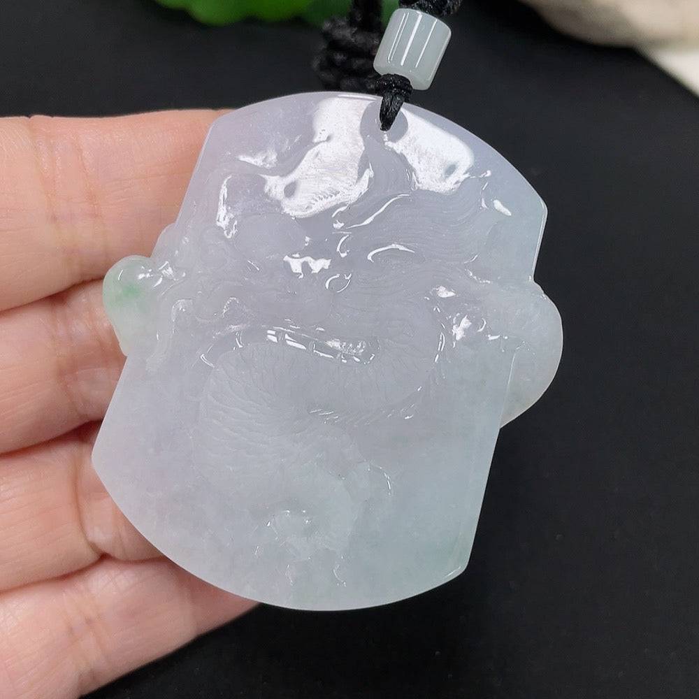 Jadeite dragon pendant from HUILIU HQ showcasing a detailed carved jade dragon on a rope, weighing approximately 34.52g.