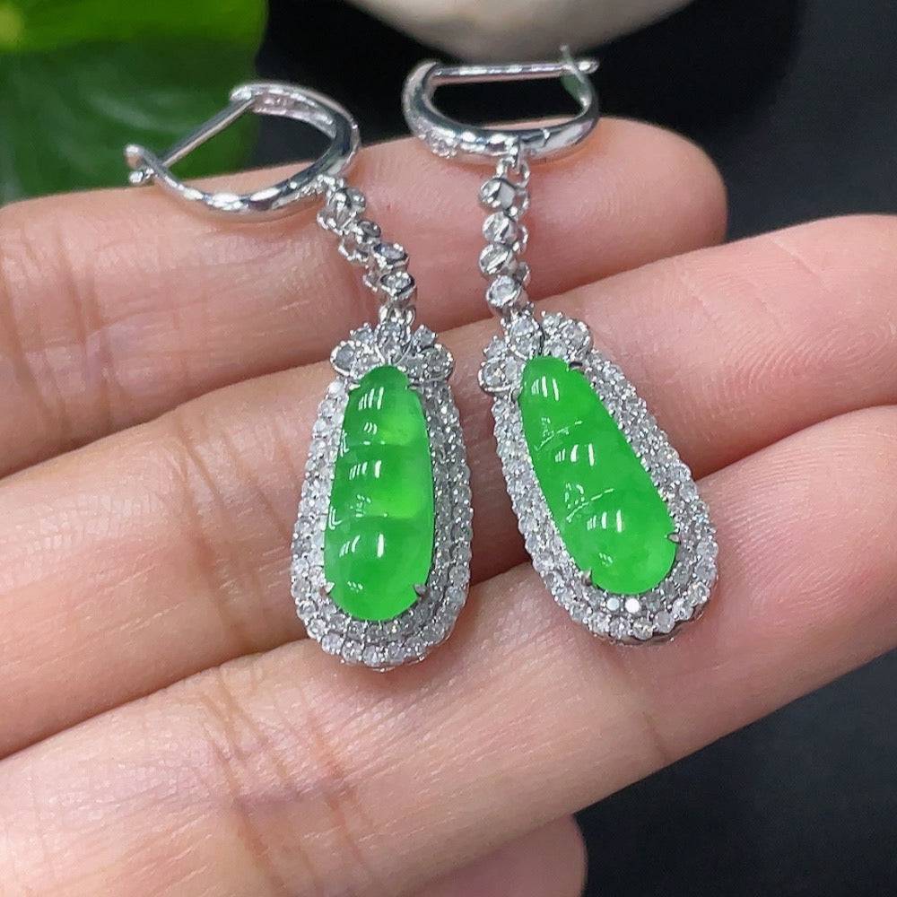 Jadeite earrings with 18k gold and diamond accents, showcasing elegant green jade stones and detailed craftsmanship.
