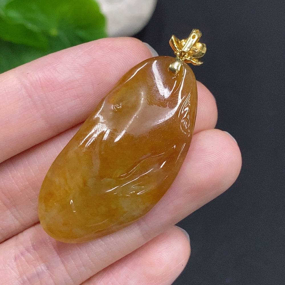 Huiliu Jadeite Auspicious Abundance Pendant with clasp, featuring intricate carvings and a smooth polished surface.