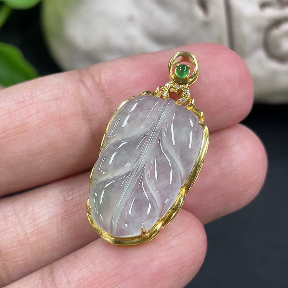 Jadeite leaf pendant in 18k gold with diamond inlays, crafted by HKHQ, weighing approximately 2.17 grams.