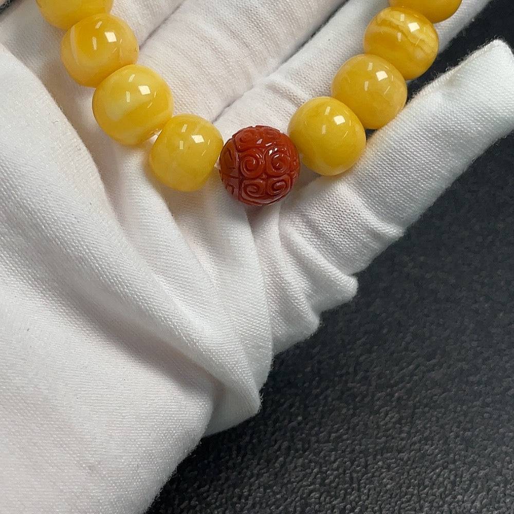 Amber beeswax bracelet with Southern Red Agate beads, about 12.7mm, crafted by HUILIU HQ, showcasing natural amber and red agate stones.