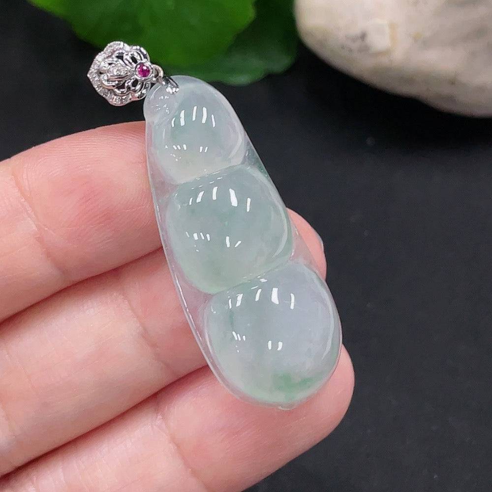 Jadeite lucky bean pendant by HUILIU HQ with diamond accents, 18K gold, showcasing smooth green jade and detailed craftsmanship.