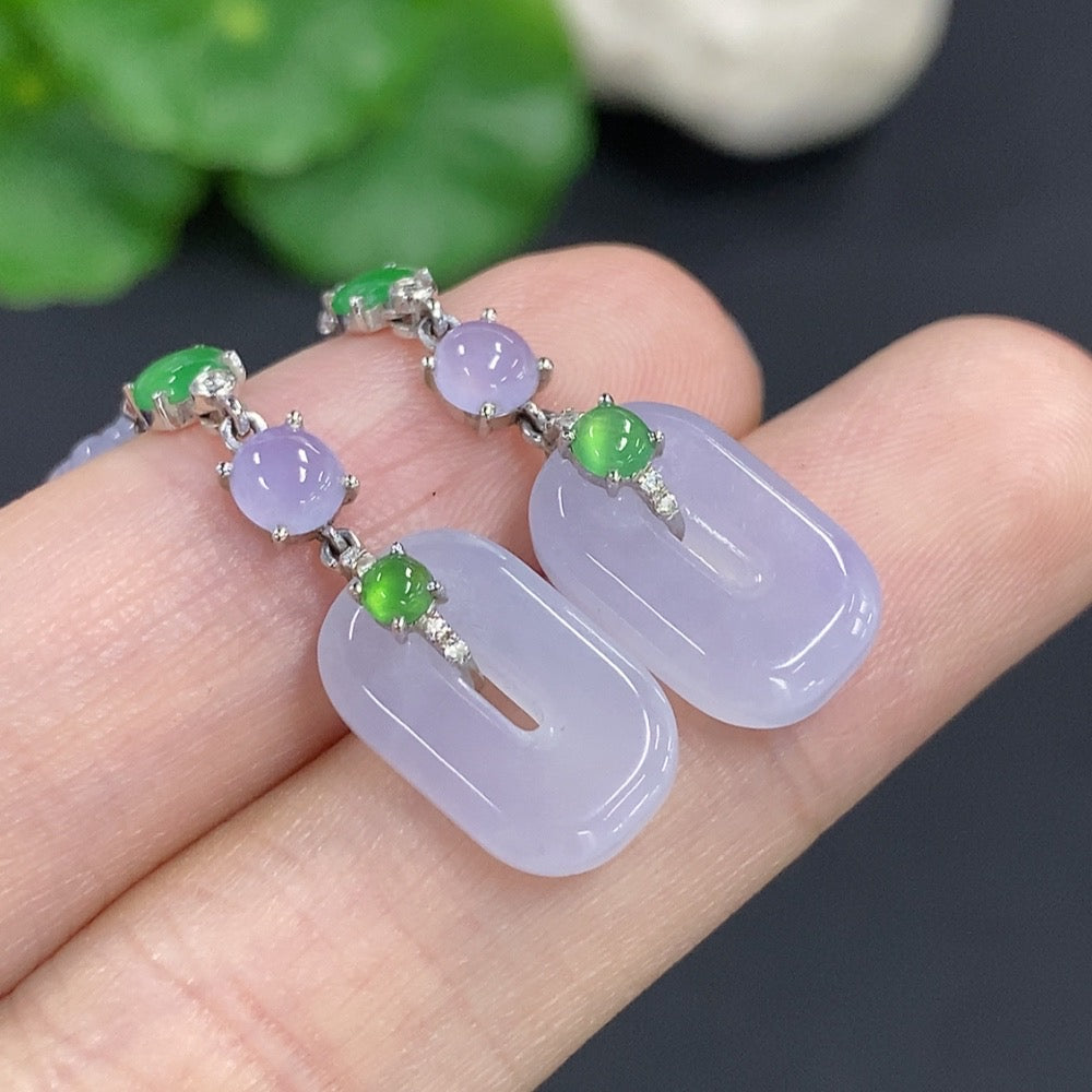 HKHQ jadeite earrings set in 18k gold with diamond accents, showcasing elegant design and sparkling details.