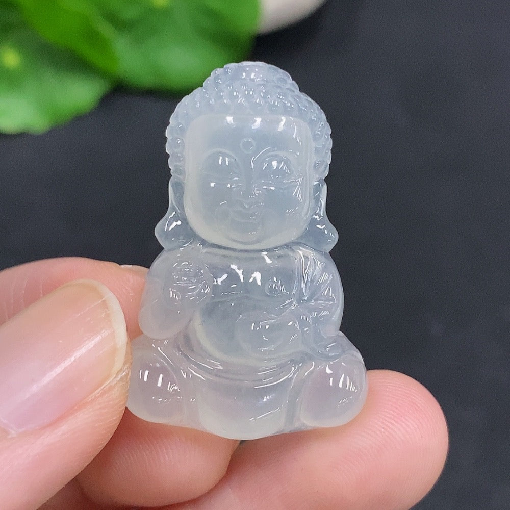 Jadeite Baby Buddha pendant in green jade, weighing approximately 7.5g, crafted by HUILIU HQ, close-up of detailed pendant design