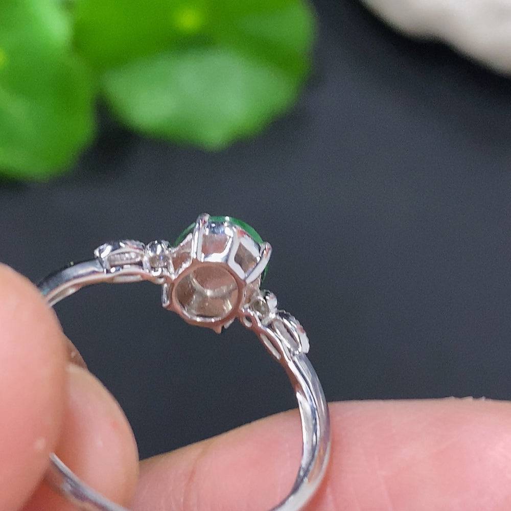 Jadeite cabochon ring with diamond accents in 18K gold, size 16, featuring a smooth jade gemstone and elegant gold band.