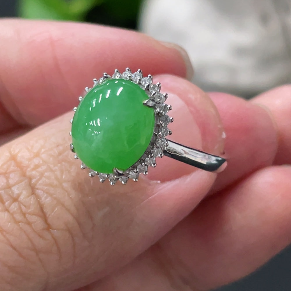 Huiliu HQ Jadeite cabochon ring with diamond accents, featuring a polished jade gemstone and elegant silver band.