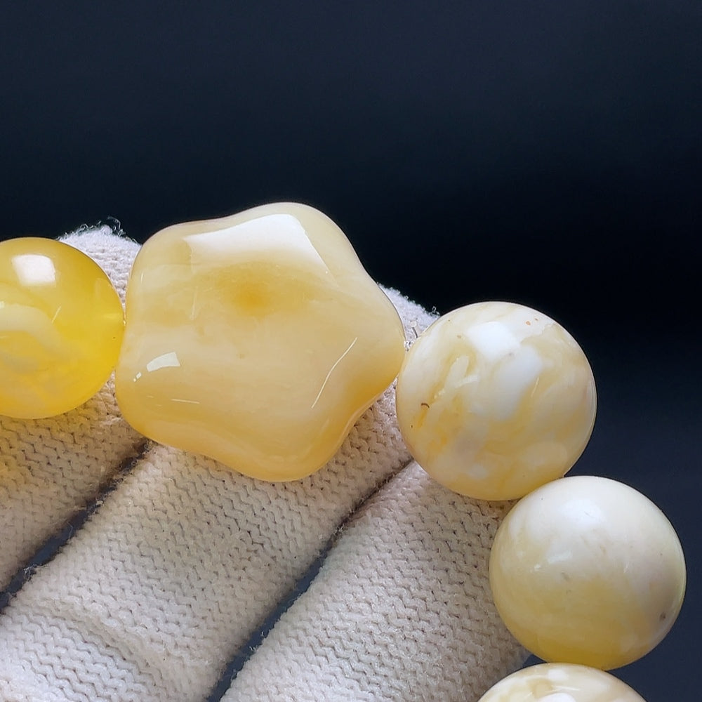 Huiliu Amber Beeswax Bracelet with 15.1mm beads, natural amber jewelry featuring warm, honey-colored stones.