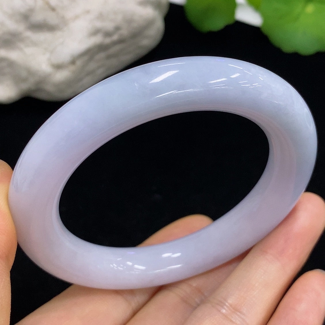 HKHQ jadeite round bangle in size 54.5, weighing 71.4g, showcasing a smooth, polished green jade bracelet with a rounded design.