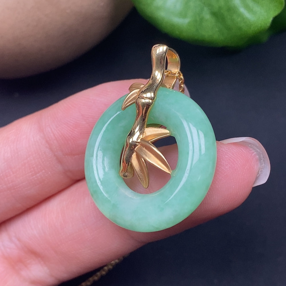Jadeite inlaid pendant donut necklace by HKHQ, 18k gold, approximately 9.34g, showcasing intricate jadeite inlay and elegant design.