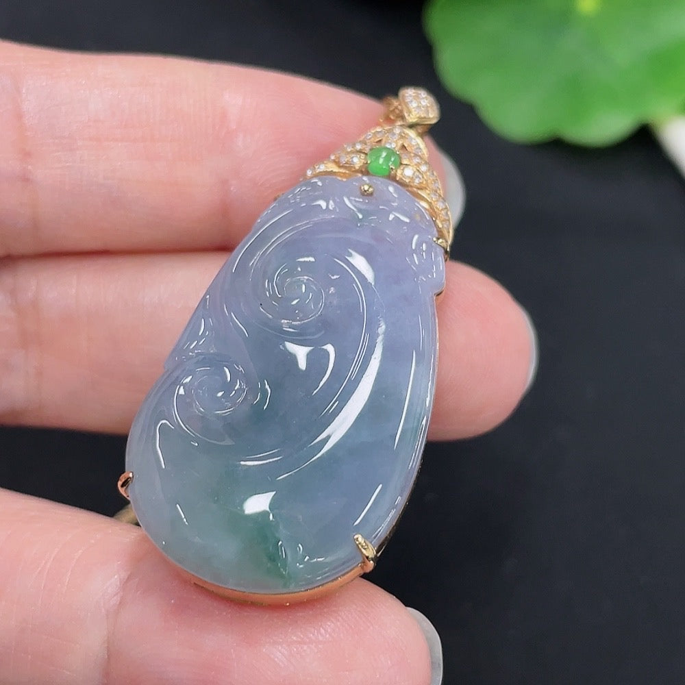 Jadeite Ruyi pendant with diamond accents in 18K gold, featuring a carved jade piece and a matching gold chain.