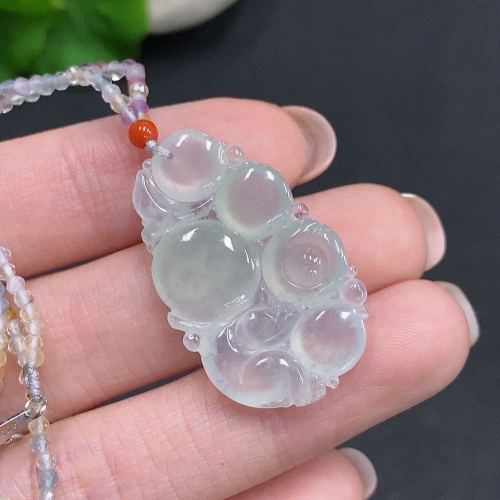 Huiliu Jadeite Monkey Presenting Longevity pendant with non-jadeite chain and rope, showcasing detailed jade craftsmanship.
