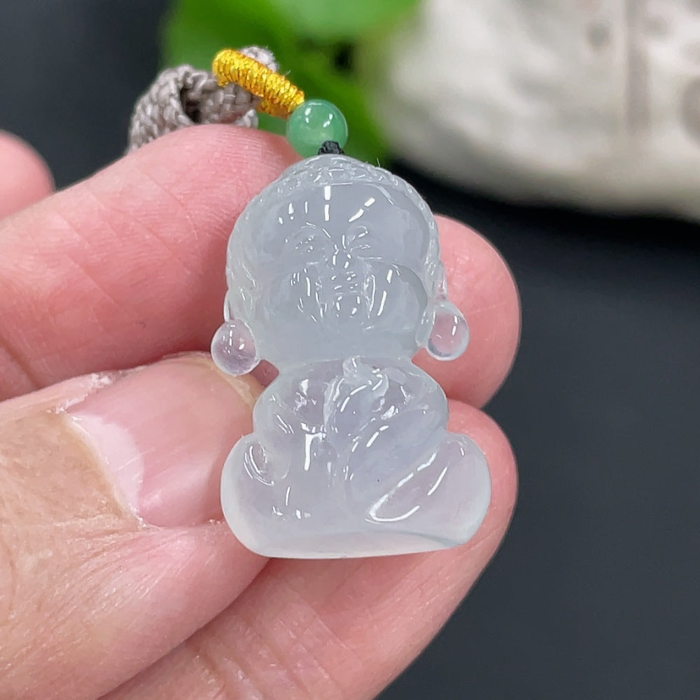Jadeite baby Buddha pendant by HUILIU HQ featuring a smooth, polished jade carving of a peaceful baby Buddha figure.