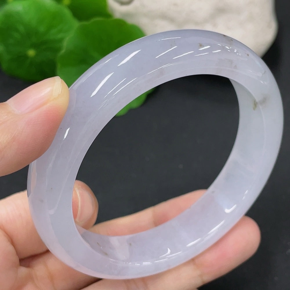 Huiliu certified jadeite round bracelet featuring smooth, polished green jade beads on a delicate string.