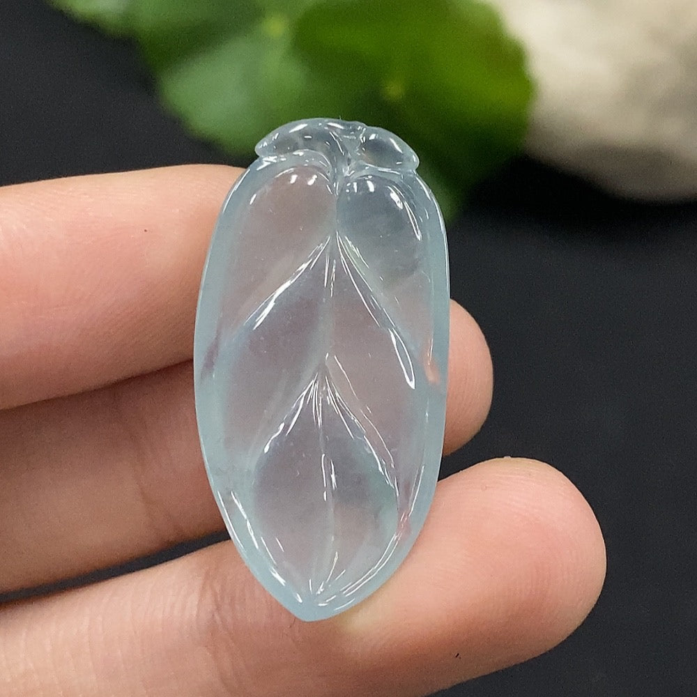 Jadeite leaf inlay piece weighing approximately 4.52g from HUILIU HQ, showcasing detailed jade craftsmanship and natural green color.