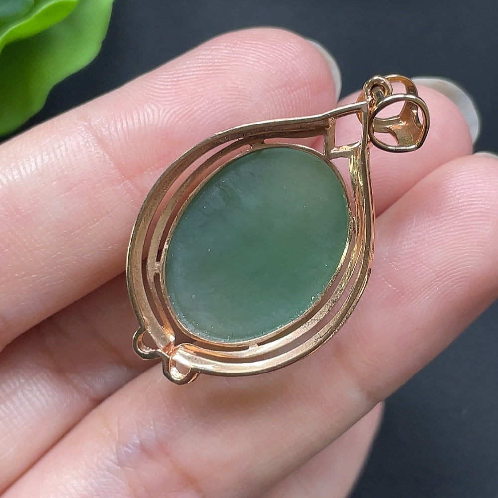 Hetian Jade inlaid cabochon pendant, 18K gold with diamond accents