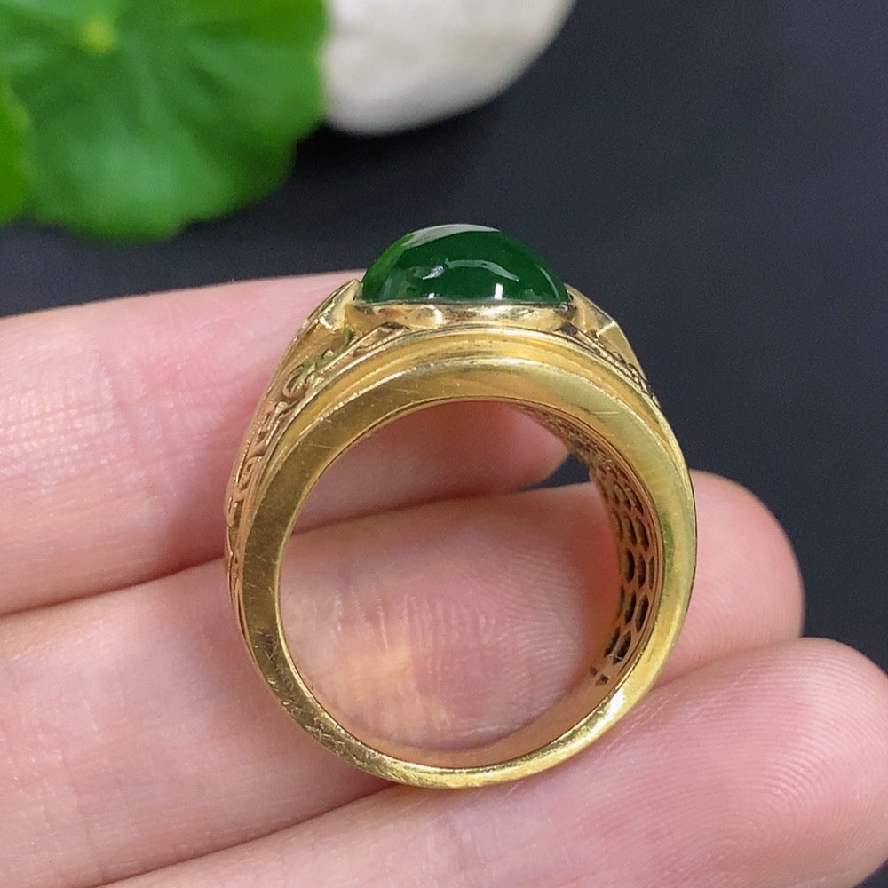 Elegant Jadeite cabochon ring with 18K gold band from HKHQ, showcasing a smooth, polished green gemstone.