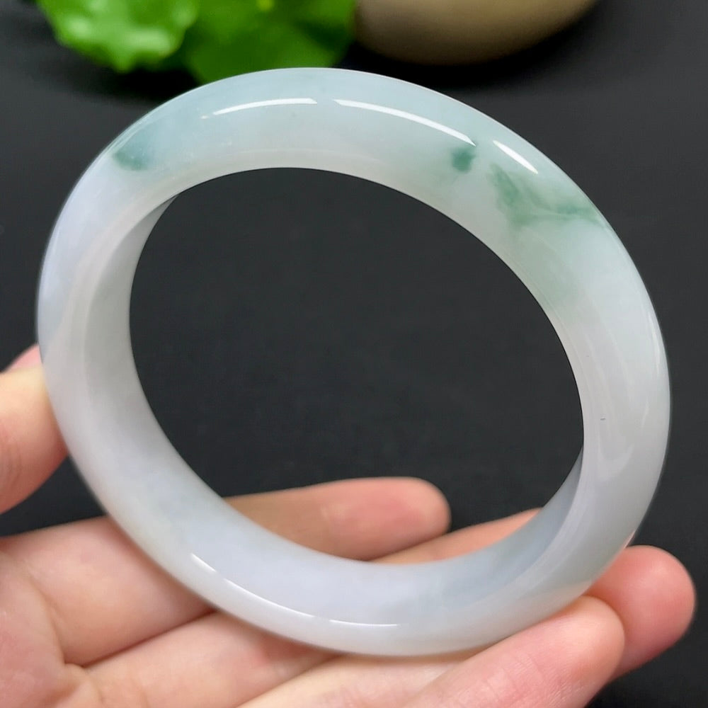 HKHQ jadeite round bangle, size 57.1, weighing 56.21g, showcasing smooth, polished green jadeite bracelet with elegant round shape.