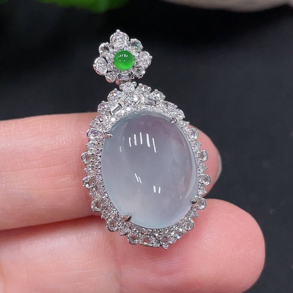 Jadeite pendant with 18K gold mount accented with small diamonds, from HUILIU HQ, showcasing the elegant jewelry design.