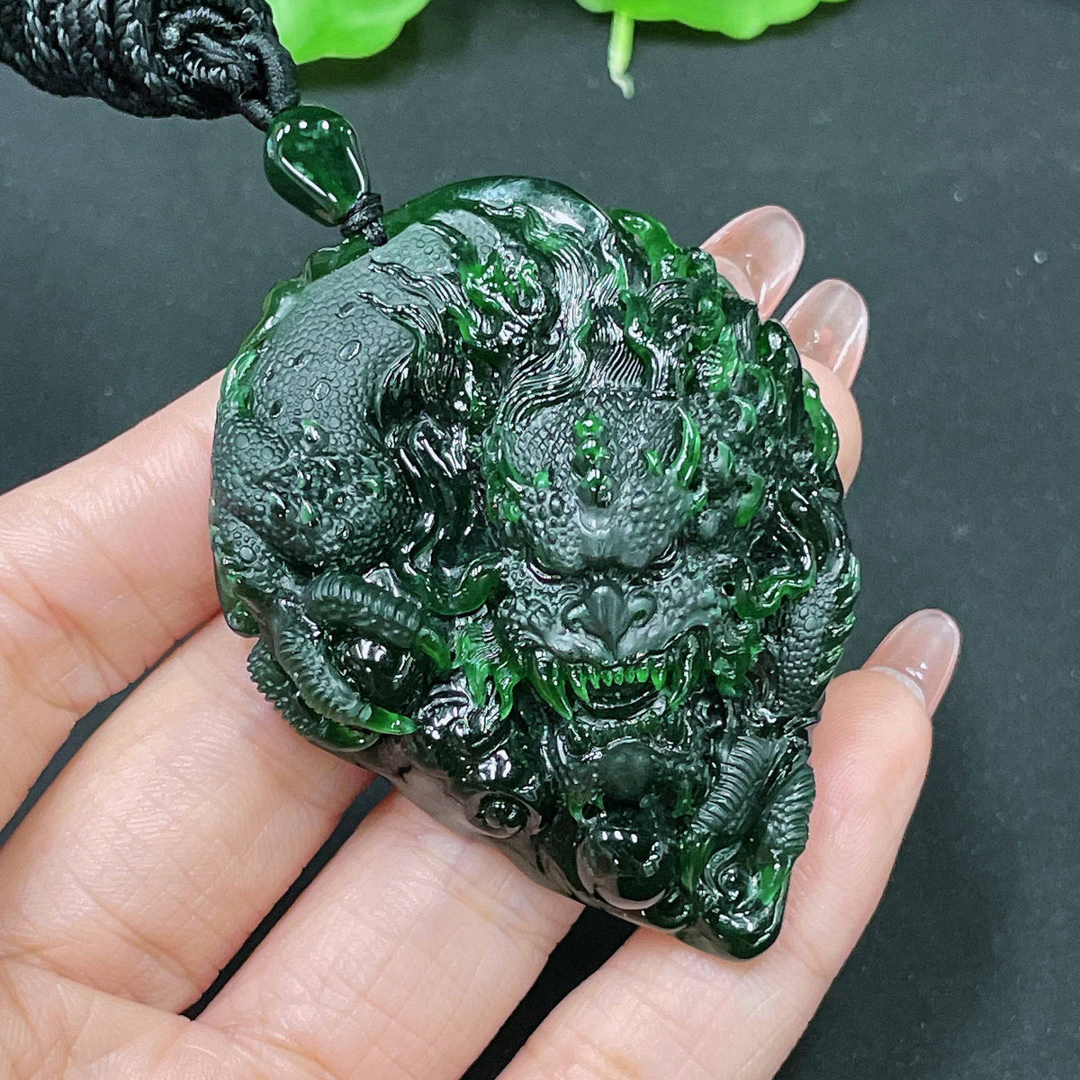 Jadeite pendant featuring a dragon plaque, crafted from green jade stone, weighing approximately 49.58 grams, by HUILIU HQ.