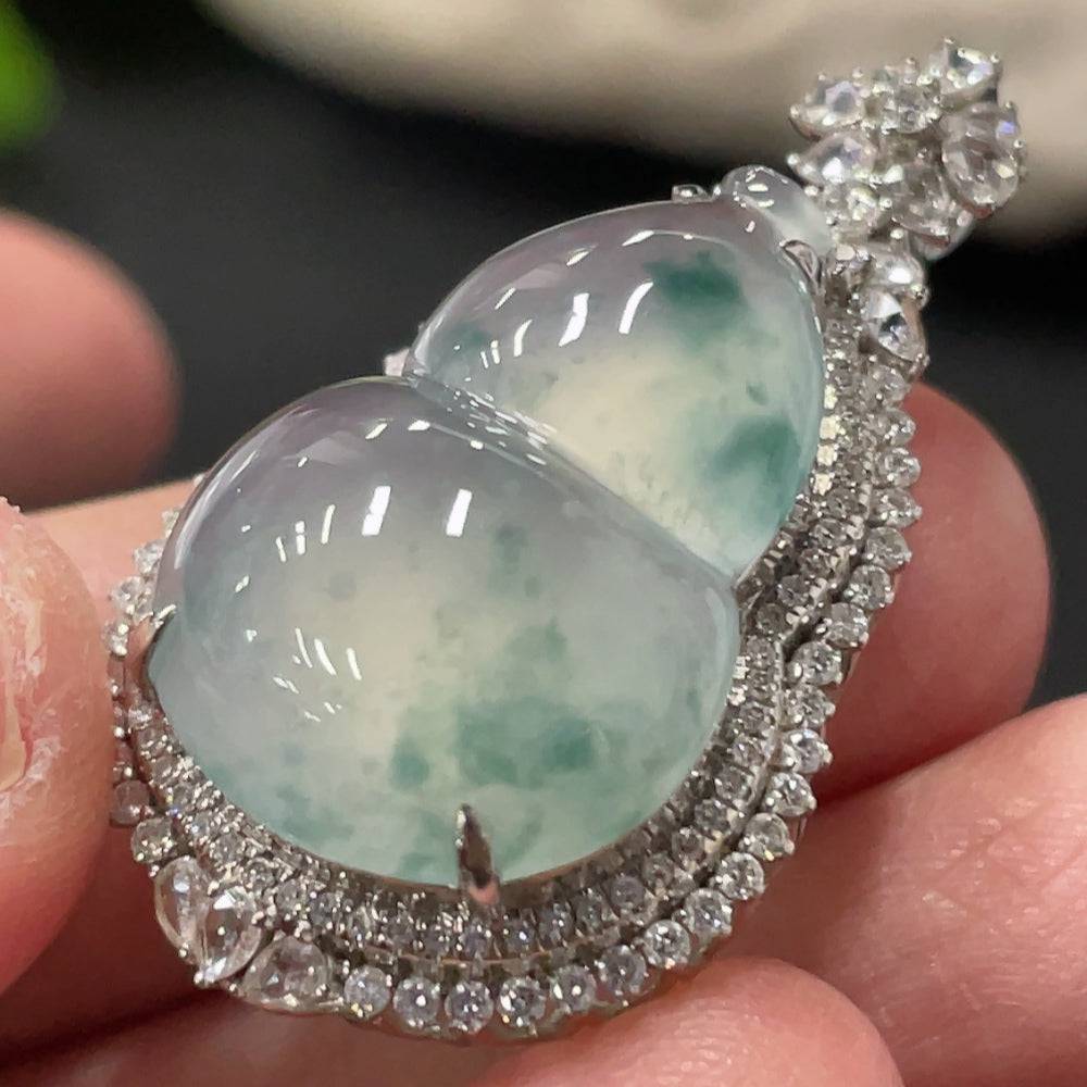 Jadeite gourd pendant with 18K gold setting and small diamond accents, lightweight jewelry piece by HUILIU HQ.