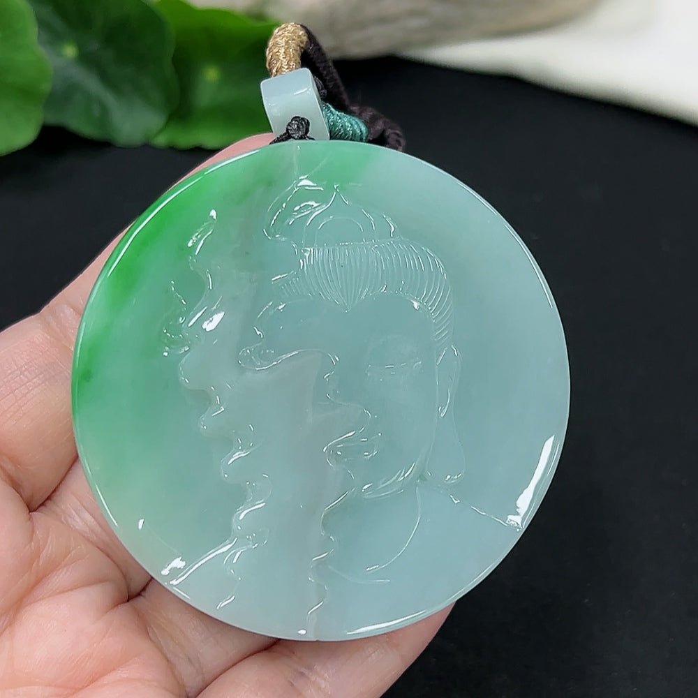 Jadeite Guanyin pendant with intricate carving, hanging from a rope, crafted by HKHQ, weighing approximately 101 grams.