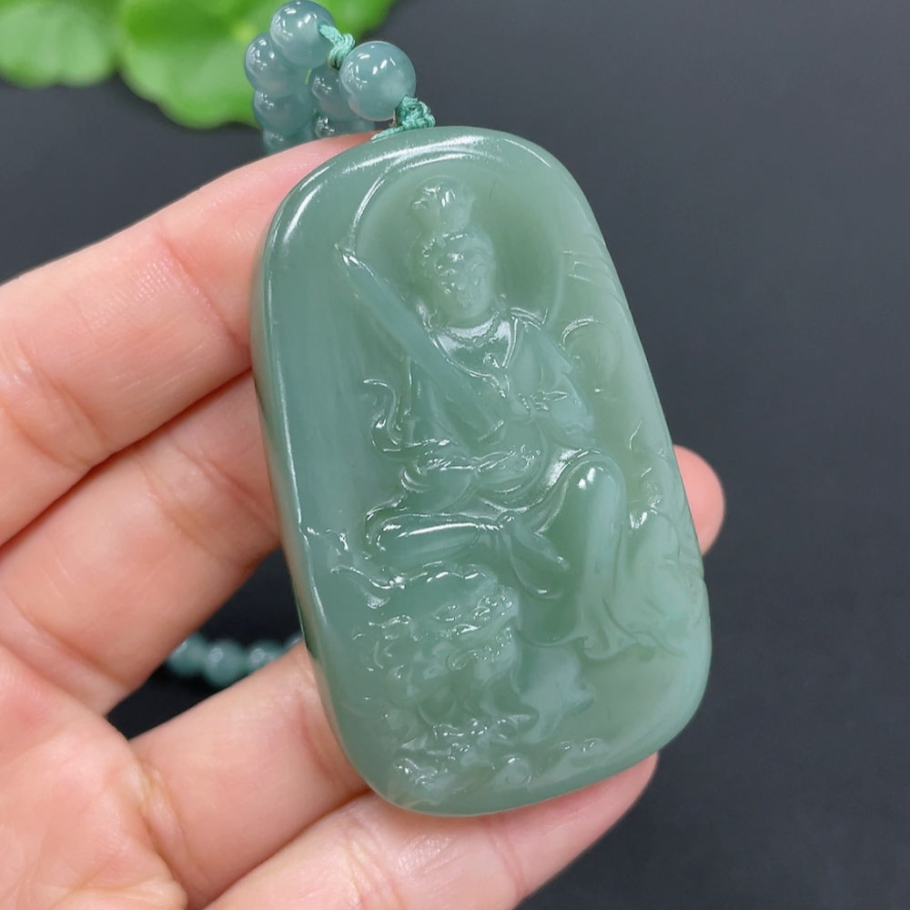 Huiliu Hetian jade pendant featuring Manjushri Bodhisattva, intricately carved jade jewelry with detailed craftsmanship.