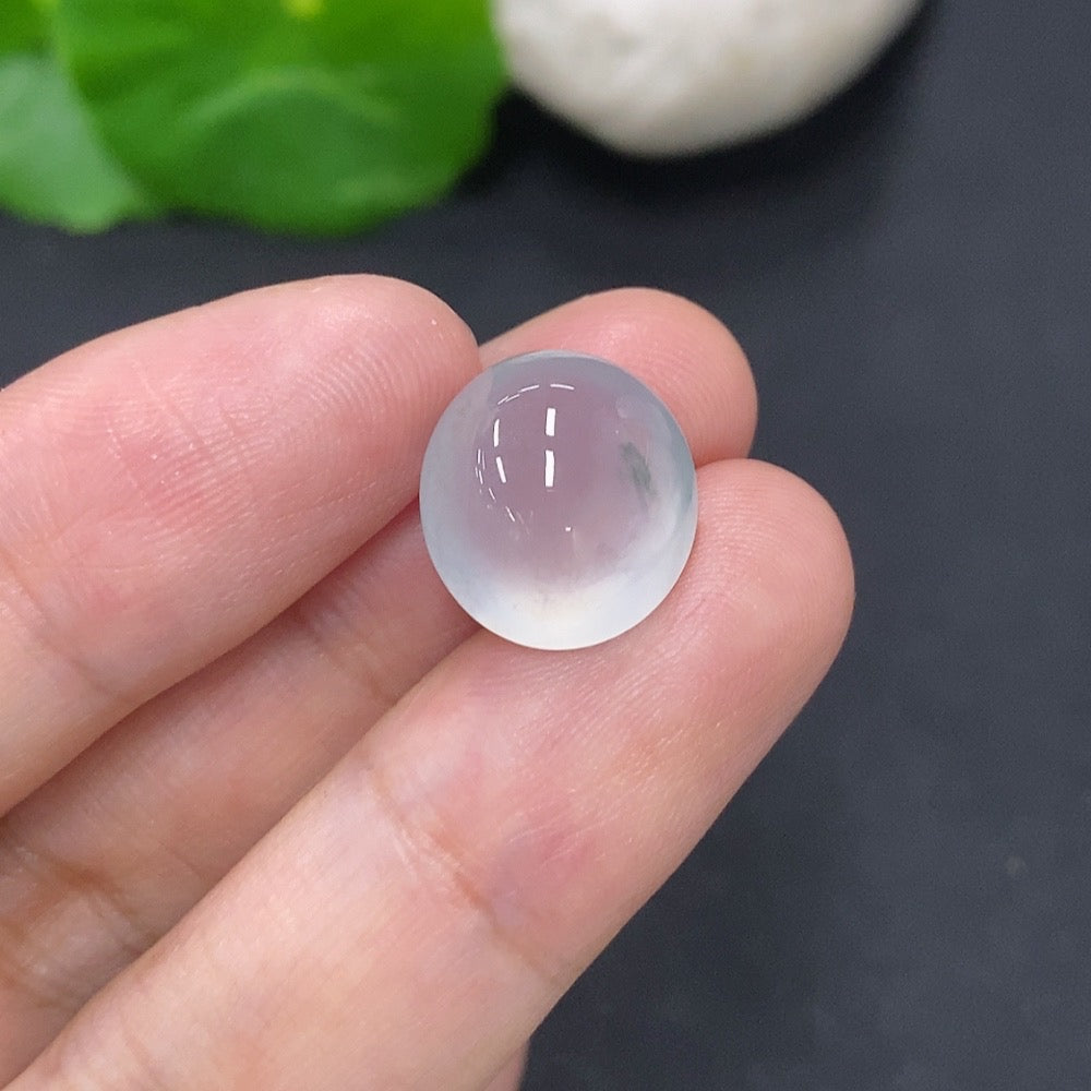 Jadeite cabochon jewelry piece weighing 2.2g, featuring smooth, polished green jadeite stone with a glossy finish.