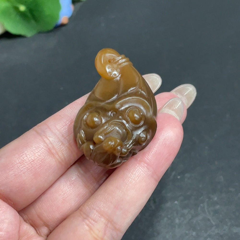 Hetian jade pendant with quacking for wealth design, crafted from HKHQ jade, weighs approximately 26.7 grams.