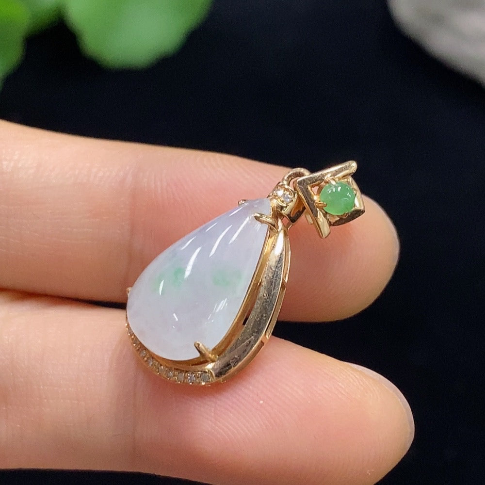 Huiliu jadeite pendant with diamond accents, featuring a polished green jade stone and intricate craftsmanship.