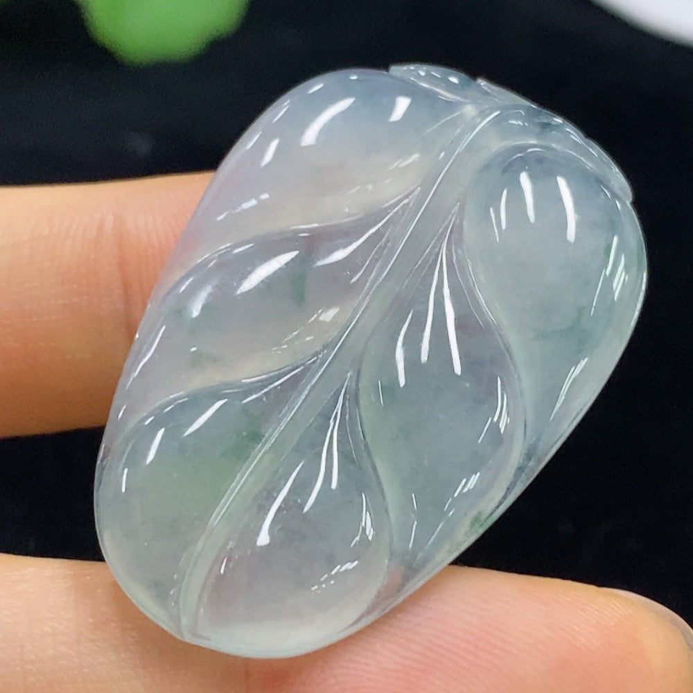 Jadeite leaf pendant from HUILIU HQ, crafted from jade, weighing approximately 9.95 grams, showcasing detailed leaf design.