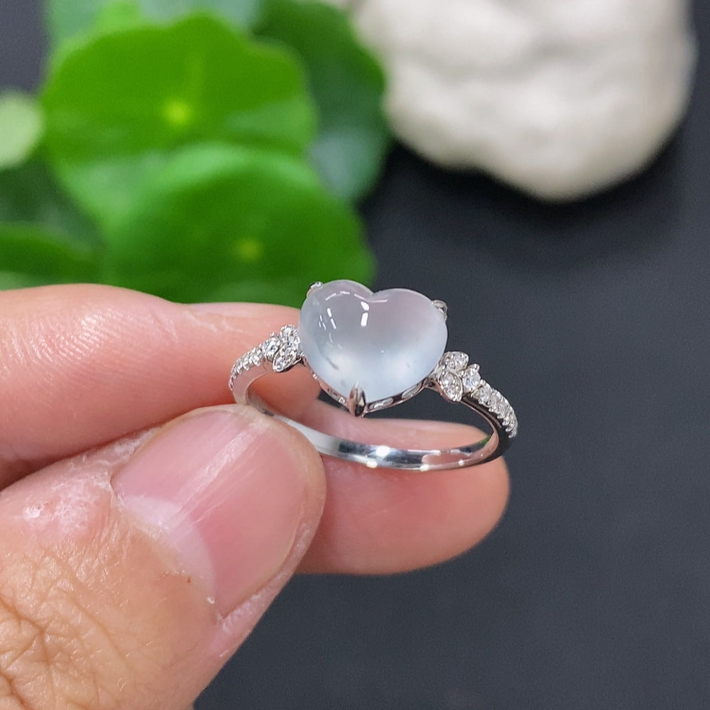 Jadeite inlaid ring with 18K gold and diamond accents, size 13, weighing approximately 1.9g, featuring intricate jade design.