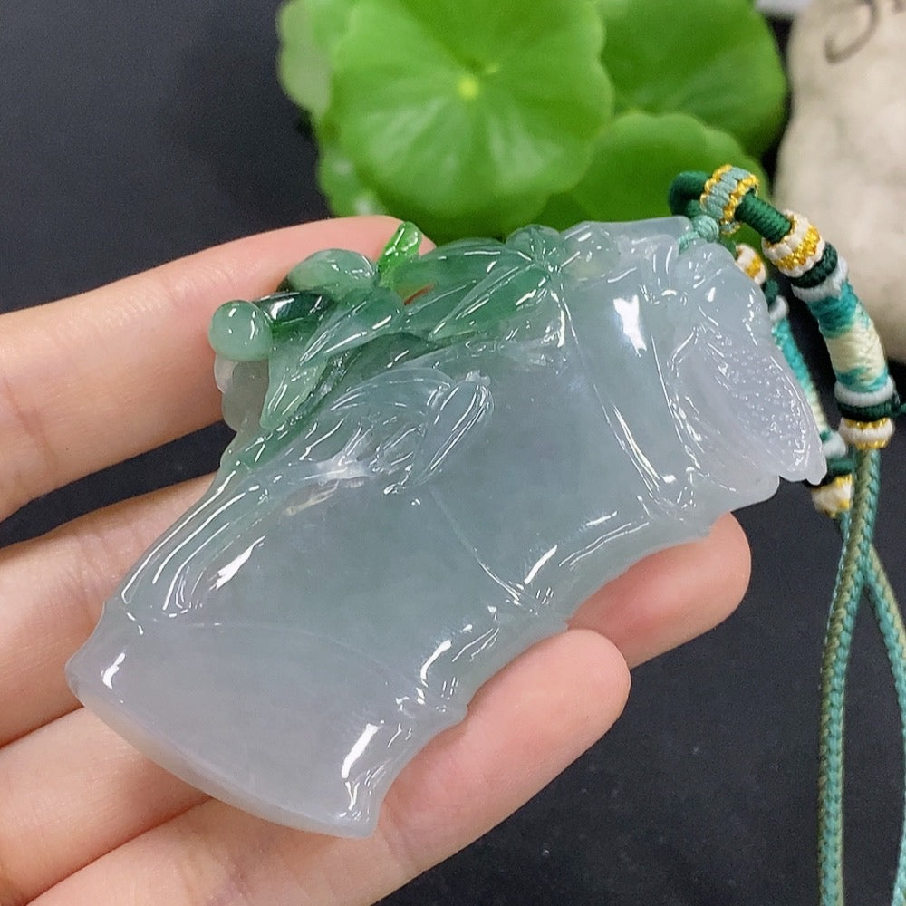 Jadeite bamboo pendant with mineral accents, weighed about 59.89g, crafted by HKHQ, showcasing natural jade and mineral components.