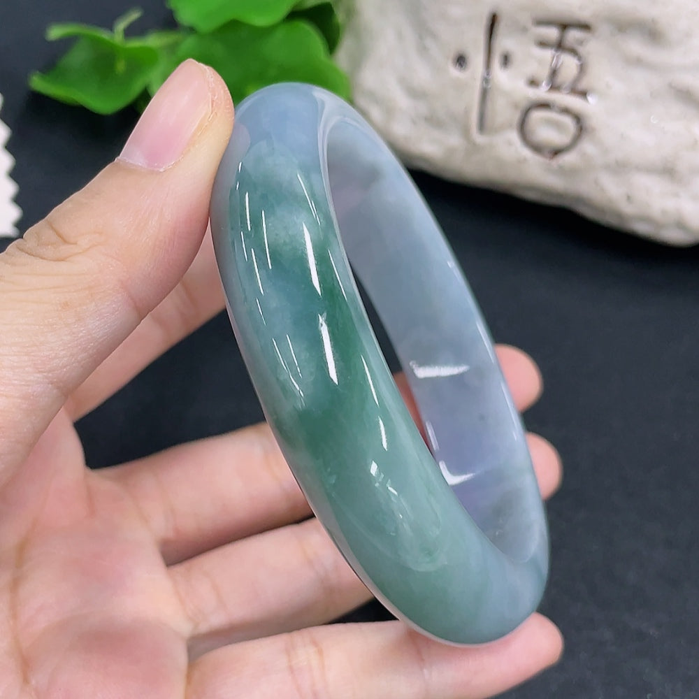 HKHQ jadeite round bangle, size 65, 83.3g, showcasing smooth, polished jadeite bracelet with a round design.