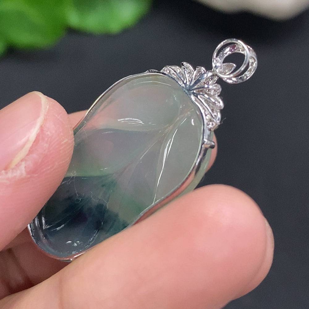 Jadeite leaf inlay pendant with 18K gold and diamond accents, crafted by HUILIU HQ, weighs approximately 3.9 grams.
