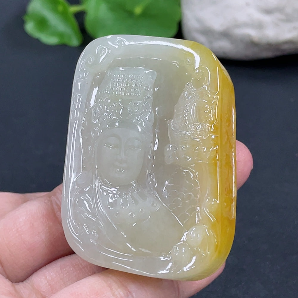 Jadeite Guanyin pendant from HKHQ, carved jade with intricate details, weighing approximately 64.7 grams.