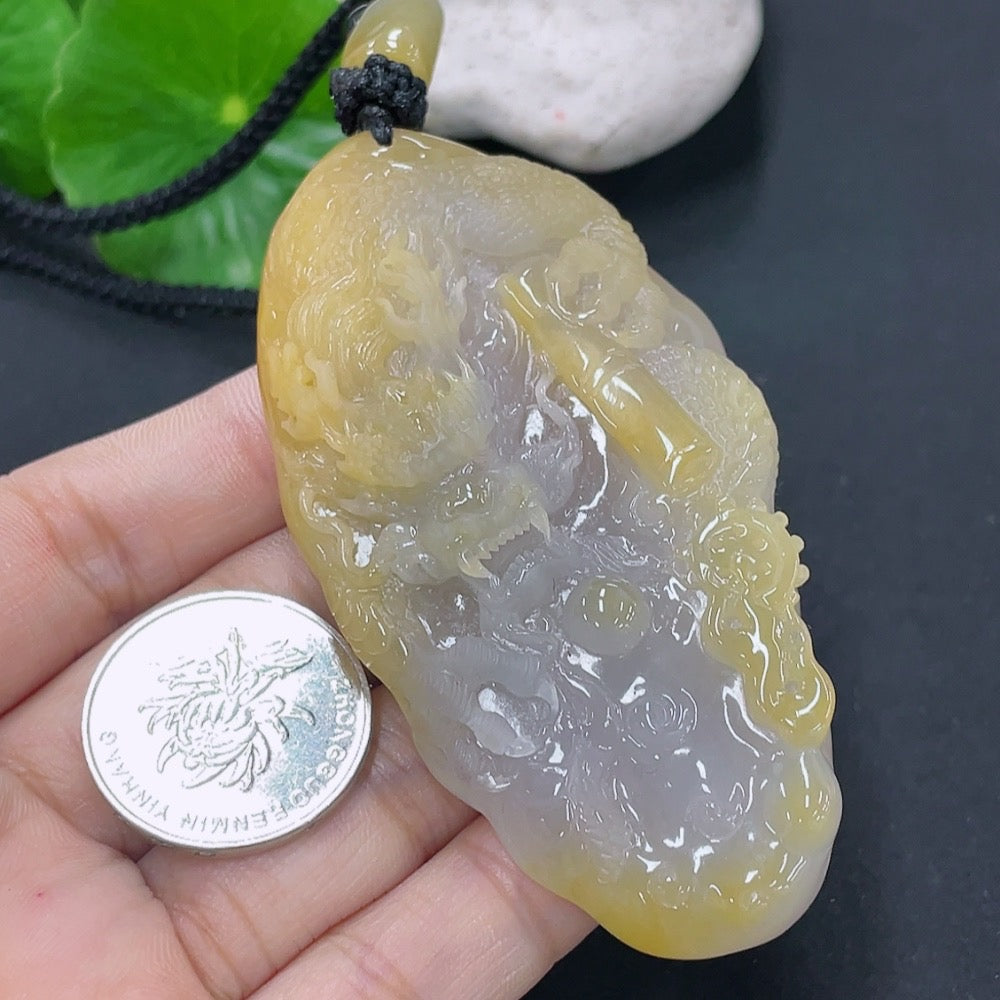Jadeite dragon pendant with a total weight of approximately 70.5g including the cord (matching beads are non-A)