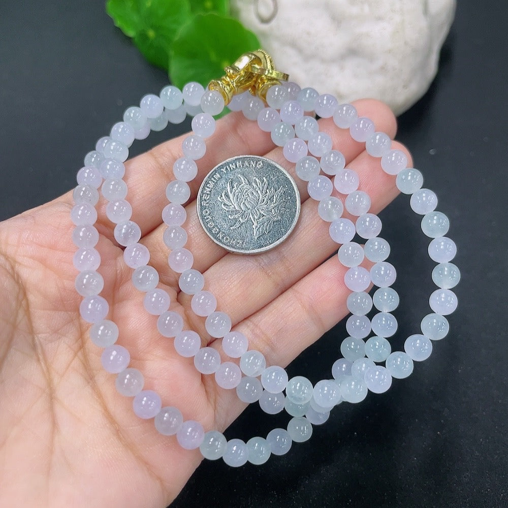 HKHQ jadeite bead necklace with 5.2mm jade beads, approximately 32.1g, showcasing polished, smooth jade jewelry.