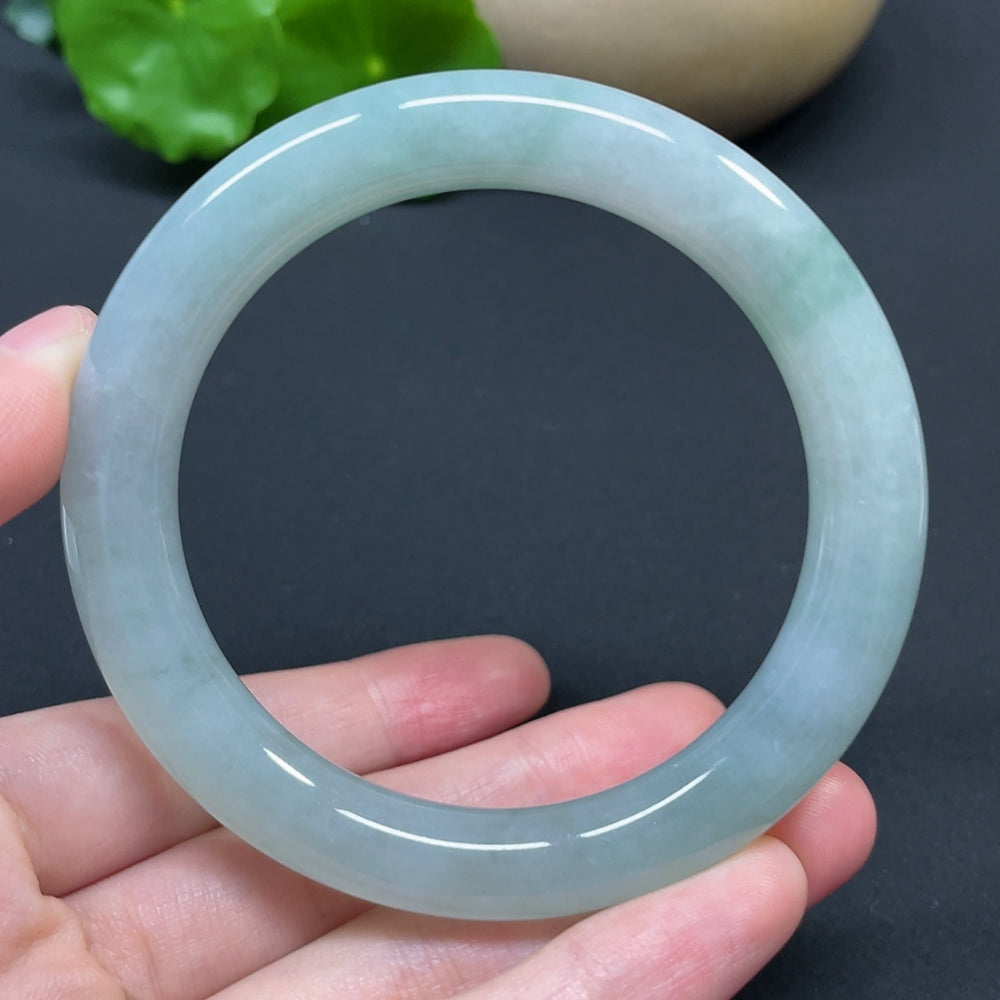 HKHQ jadeite round bangle, size 56.8, 53.94g, showcasing smooth, polished green jadeite with a classic circular design.