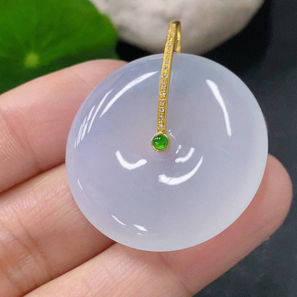 Jadeite pendant with peace knot design, 18k gold accents, diamond details, from HUILIU HQ, weighing approximately 9.98g.