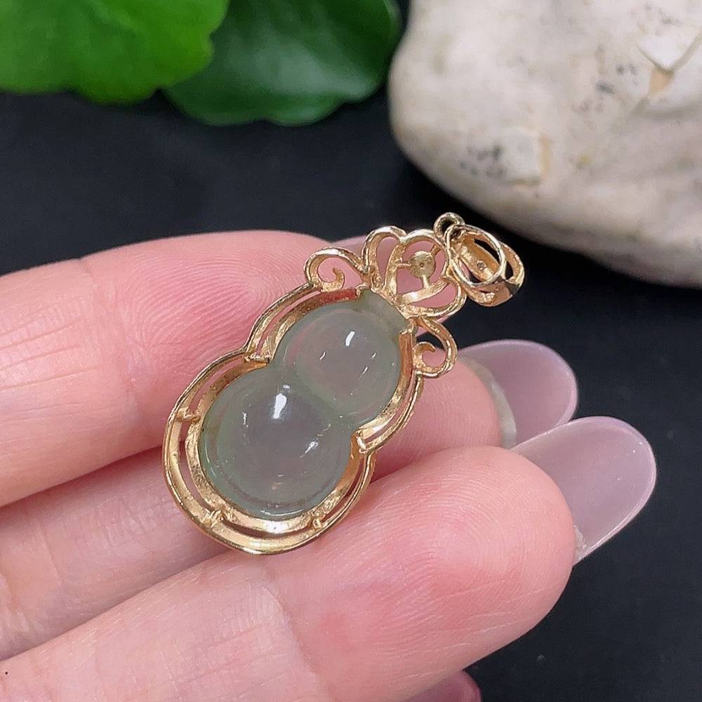 Jadeite gourd pendant with diamond accents, 18K gold setting, crafted by HUILIU HQ, showcasing detailed jade carving and gold finish.