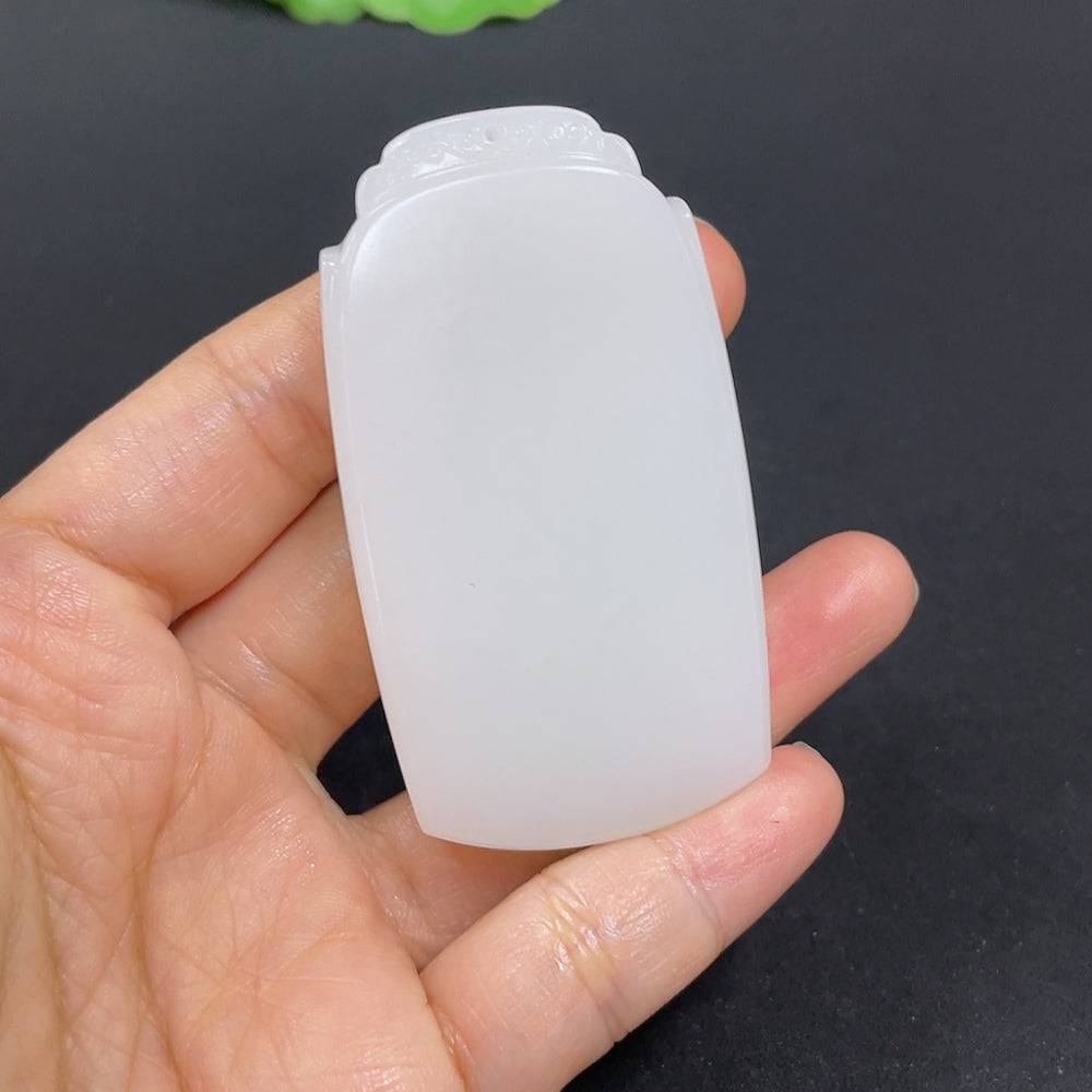 Huiliu certified Hetian jade pendant, plain smooth jade pendant with natural green color, showcasing traditional craftsmanship.