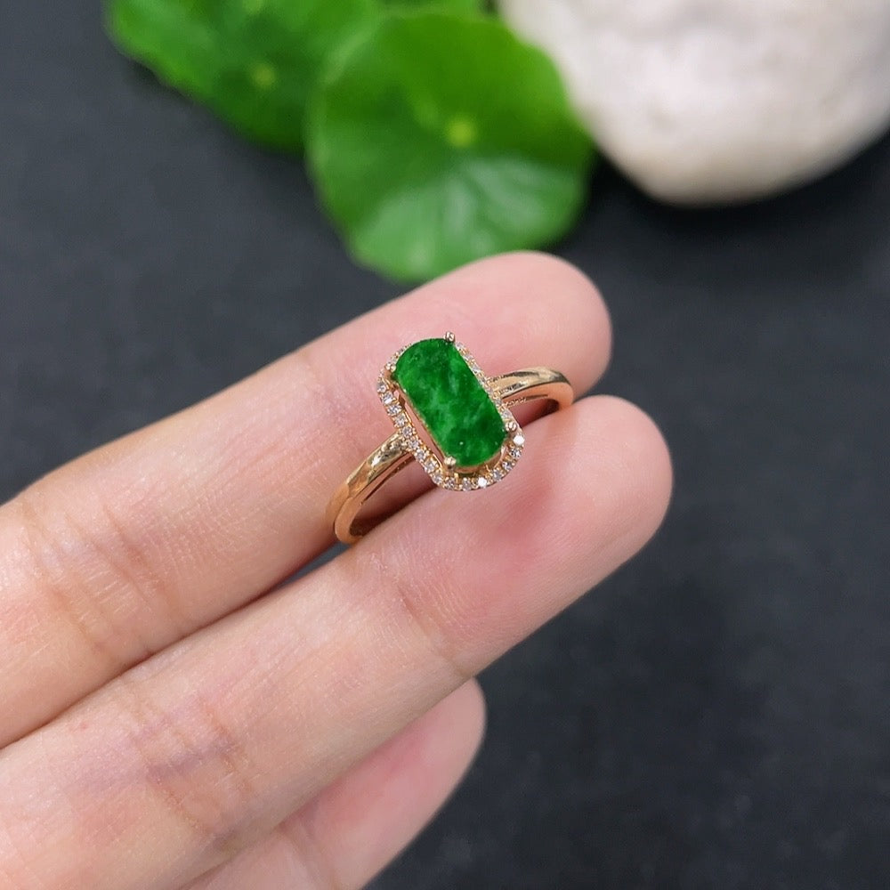 Jadeite and diamond ring in 18k gold, size 14, with intricate design and sparkling gemstones, weighing approximately 1.74 grams.
