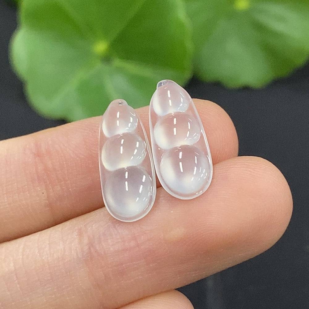 Jadeite auspicious bean inlay piece from HUILIU HQ, showcasing detailed green jade craftsmanship and intricate design.