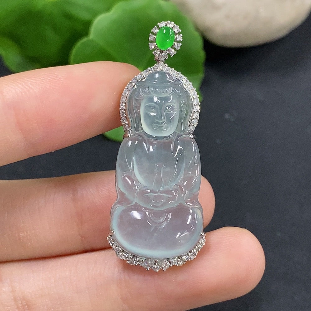 Jadeite Guanyin pendant set in 18K gold with diamond accents, featuring a detailed carved jade figure on a gold chain.