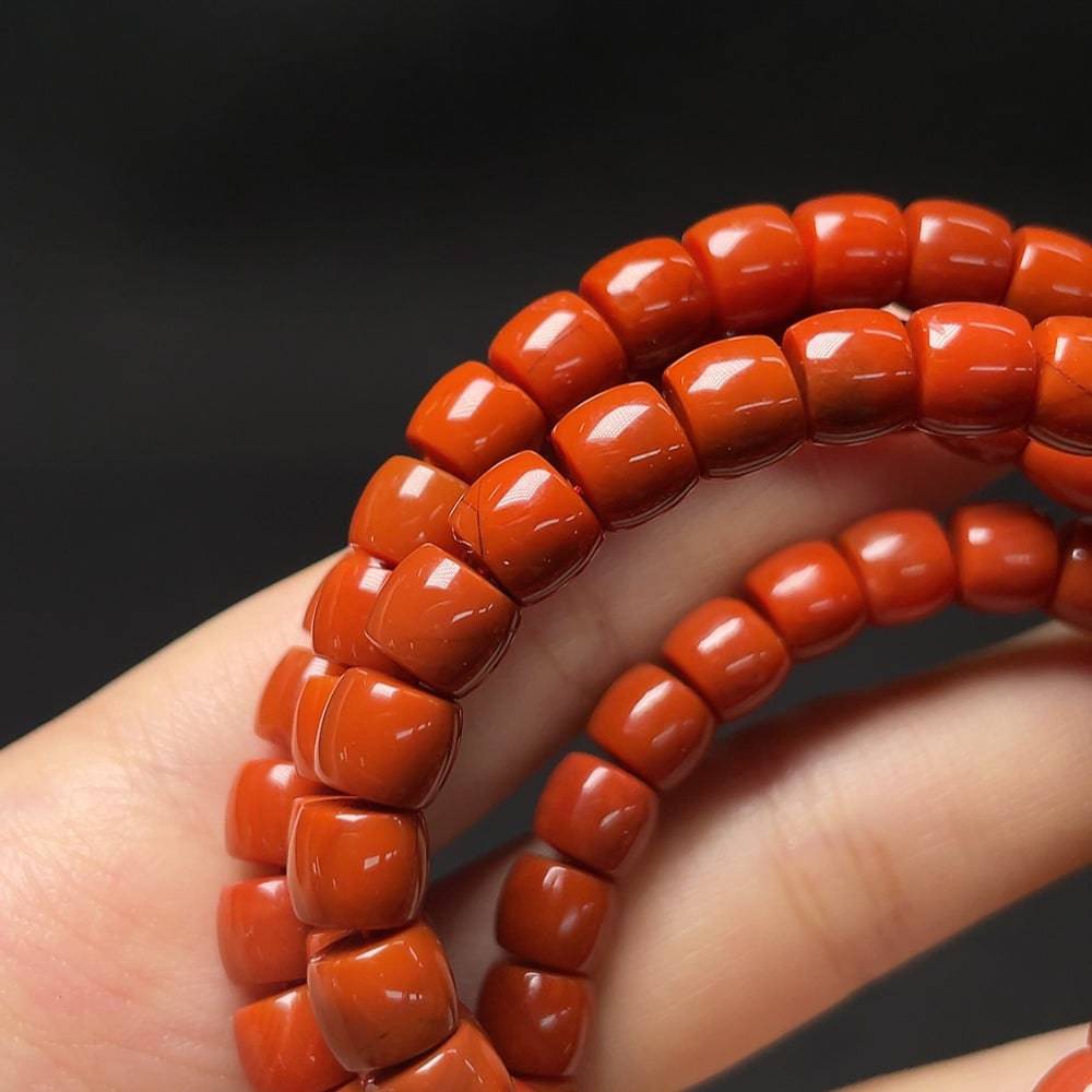 Red agate gemstone bead strand with visible organic matter, 7.1mm size, featuring natural textures, from HUILIU HQ certified gemstones.