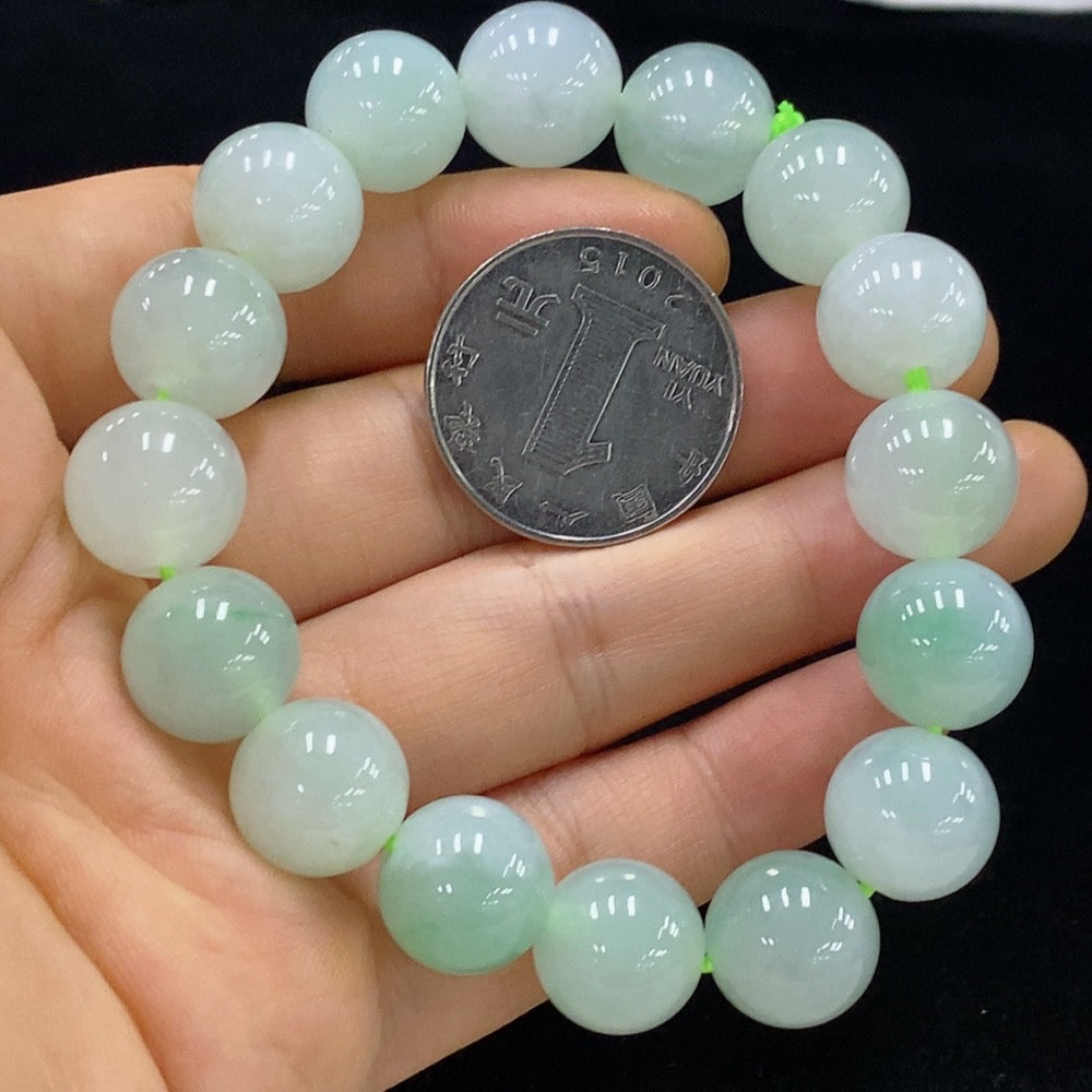 Huiliu Jadeite bracelet, 12.8mm wide, featuring smooth green jade beads, certified by HUILIU HQ.