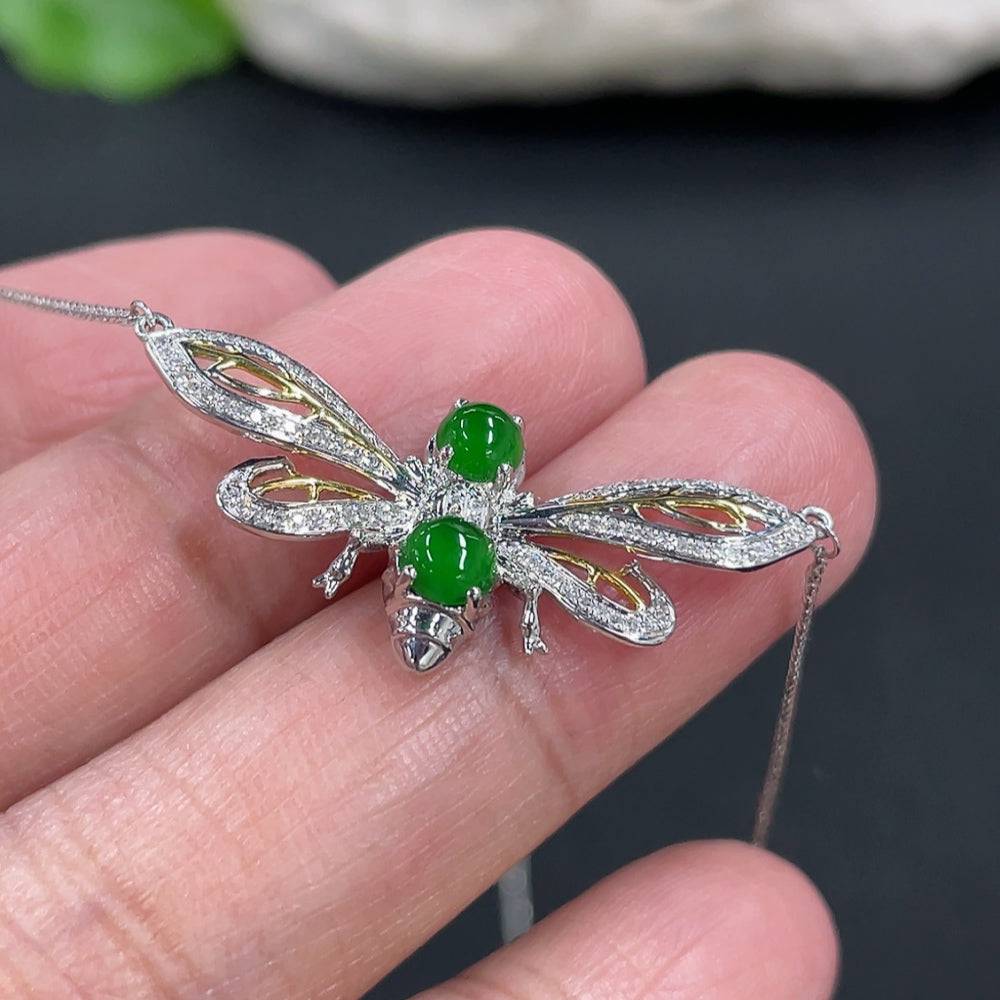 Huiliu jadeite cabochon pendant necklace with diamond accents, showcasing a polished green jade stone on a delicate chain.