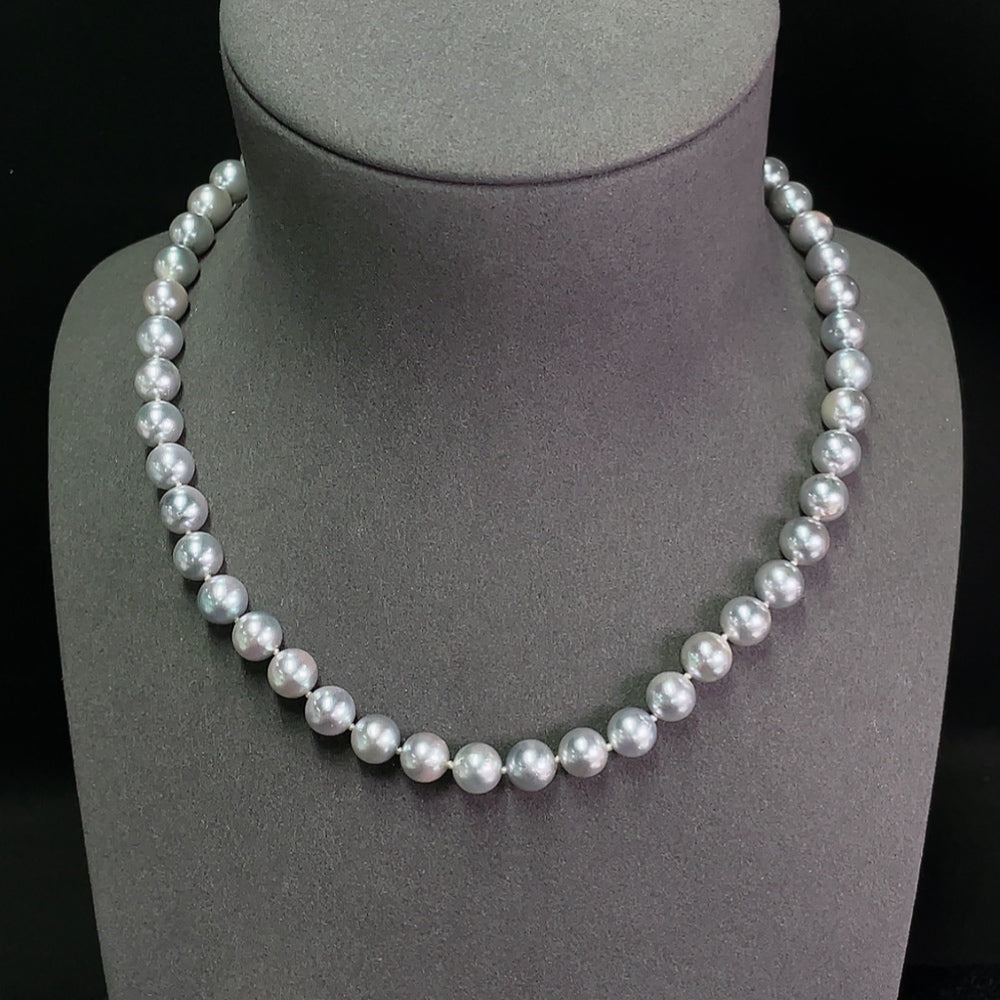 Saltwater pearl strand necklace by HKHQ featuring elegant, lustrous non-gold pearls on a classic jewelry piece.