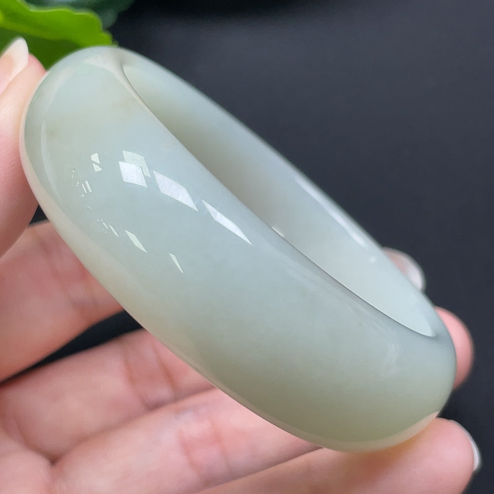 HKHQ Hetian Jade round bracelet, 52mm diameter, weighing approx. 60.95g, showcasing smooth, polished jade beads.